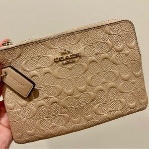 Coach Embossed Monogram Wristlet